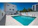A pristine outdoor pool and lounge area for residents at 635 S Orange Ave # 404, Sarasota, FL 34236