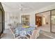 Spacious balcony with seating, ceiling fan, and beautiful nature views at 6450 Wild Oak Bay Blvd # 240, Bradenton, FL 34210