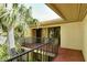 Spacious balcony with a terracotta floor and metal railing, perfect for relaxation at 6450 Wild Oak Bay Blvd # 240, Bradenton, FL 34210