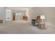 Open living room with plush carpeting, neutral walls, and comfortable seating with stylish decor at 6450 Wild Oak Bay Blvd # 240, Bradenton, FL 34210