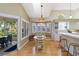 Cozy breakfast nook with bay window, built-in seating, and access to the lanai at 6905 Arbor Oaks Ct, Bradenton, FL 34209