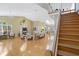 Open living room boasts high ceilings, lots of natural light, and views of the dining area at 6905 Arbor Oaks Ct, Bradenton, FL 34209