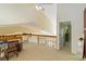 Loft space featuring exercise equipment and access to the rest of the house at 6905 Arbor Oaks Ct, Bradenton, FL 34209