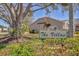 The Tara The Villas community sign surrounded by beautifully manicured greenery at 6907 Stoneywalk Ct, Bradenton, FL 34203
