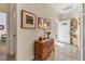 Bright foyer showcasing tile flooring, decorative furniture, and an entryway to other rooms at 6907 Stoneywalk Ct, Bradenton, FL 34203
