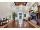 Elegant lobby features wood floors, a fireplace, and an ornate chandelier at 6907 Stoneywalk Ct, Bradenton, FL 34203