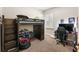 Fun bedroom with a loft bed, providing plenty of space for play and study with natural light at 6913 Neopolitan Ct, Apollo Beach, FL 33572