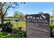 Community dog park with clear signage listing rules for pet owners at 6913 Neopolitan Ct, Apollo Beach, FL 33572