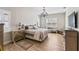 Serene main bedroom featuring ample natural light and elegant decor at 6913 Neopolitan Ct, Apollo Beach, FL 33572