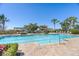 Large community pool area featuring a clear blue pool and brick paver decking at 6913 Neopolitan Ct, Apollo Beach, FL 33572