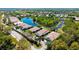 A bird's eye view of this beautiful neighborhood with serene lakes, golf course and lush greenery at 7004 Old Tabby Cir, Lakewood Ranch, FL 34202
