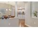 Elegant dining area with views of the kitchen, perfect for entertaining guests and Gathering gatherings at 7004 Old Tabby Cir, Lakewood Ranch, FL 34202