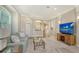 Open-concept living room with modern decor, seamlessly blending style and functionality for comfortable living at 7004 Old Tabby Cir, Lakewood Ranch, FL 34202