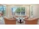 Bright sitting area with picturesque views of the outdoors, creating a peaceful and inviting space at 7004 Old Tabby Cir, Lakewood Ranch, FL 34202