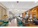 The clubhouse bar features ample seating, views of the adjacent property, and a snack area at 730 Foggy Morn Ln, Bradenton, FL 34212
