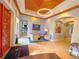 A glimpse inside the River Club shows a cozy waiting area, tile flooring, and contemporary decor at 730 Foggy Morn Ln, Bradenton, FL 34212