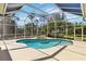 Enclosed sparkling pool and spa area, offering privacy and a refreshing retreat at 742 Shadow Bay Way, Osprey, FL 34229