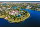 Aerial view of a luxurious community with pools, lakes, and lush landscaping at 7977 Bowspirit Way, Lakewood Ranch, FL 34202