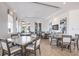 Meeting room with a large tables, natural light, and modern decor at 7977 Bowspirit Way, Lakewood Ranch, FL 34202