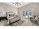 Primary bedroom with access to the outdoor pool area at 8348 Catamaran Cir, Lakewood Ranch, FL 34202