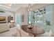 Dining room with views of the backyard and pool at 8348 Catamaran Cir, Lakewood Ranch, FL 34202