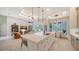 Open-concept kitchen with a large island, stainless appliances, and seamless living area integration at 8348 Catamaran Cir, Lakewood Ranch, FL 34202
