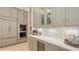 Beautiful kitchen featuring sleek countertops, stainless appliances, and custom cabinetry at 8348 Catamaran Cir, Lakewood Ranch, FL 34202