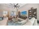 Comfortable living room with stylish decor, modern furniture, and an airy ambiance at 8348 Catamaran Cir, Lakewood Ranch, FL 34202
