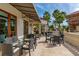 Expansive outdoor dining area with comfortable seating and shaded pergola at 8348 Catamaran Cir, Lakewood Ranch, FL 34202