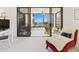 Relaxing balcony with tile floors and comfortable seating overlooks scenic outdoor views at 8767 Midnight Pass Rd # 403F, Sarasota, FL 34242