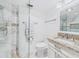 Updated bathroom with granite vanity, glass shower, and modern fixtures at 8767 Midnight Pass Rd # 403F, Sarasota, FL 34242