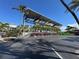 Convenient boat storage area with palm trees, landscaping, and ample parking at 8767 Midnight Pass Rd # 403F, Sarasota, FL 34242