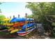 Multiple kayaks and paddleboards on wooden racks available to use at 8767 Midnight Pass Rd # 403F, Sarasota, FL 34242