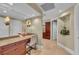Dressing area with custom vanity and cabinetry; offering ample storage and counter space at 9122 Midnight Pass Rd # 24, Sarasota, FL 34242