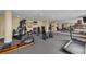 A well-equipped gym with mirrors, carpet, and multiple exercise machines at 9122 Midnight Pass Rd # 24, Sarasota, FL 34242