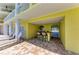 Charming outdoor lounge area, complete with a bar and comfortable seating, perfect for relaxing and entertaining at 9122 Midnight Pass Rd # 24, Sarasota, FL 34242