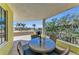 Spacious outdoor patio perfect for dining and entertaining with views of the ocean at 9122 Midnight Pass Rd # 24, Sarasota, FL 34242