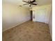Bedroom with natural light, a closet, and tile flooring at 4906 Peridia E Blvd, Bradenton, FL 34203