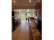 Beautiful kitchen featuring views to the outside, granite countertops and stainless appliances at 4906 Peridia E Blvd, Bradenton, FL 34203