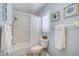 Clean bathroom featuring a white tub, toilet, vanity, and medicine cabinet at 7251 Sunnybrook Blvd, Englewood, FL 34224