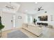 Inviting foyer with a console table, decor, and light-colored tile flooring at 7251 Sunnybrook Blvd, Englewood, FL 34224