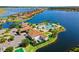 Aerial view of a beautiful community with resort-style amenities including a pool and clubhouse at 108 Maraviya Blvd, Nokomis, FL 34275