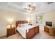 Bedroom with ceiling fan, window, and furnishings at 108 Maraviya Blvd, Nokomis, FL 34275