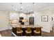 Bright kitchen featuring granite countertops, stainless steel appliances and a large kitchen island at 108 Maraviya Blvd, Nokomis, FL 34275