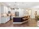 Spacious kitchen boasts granite counters, stainless appliances, and a large island with bar seating at 108 Maraviya Blvd, Nokomis, FL 34275