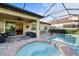 Inviting pool and spa combination with an expansive outdoor patio, perfect for outdoor relaxation at 108 Maraviya Blvd, Nokomis, FL 34275