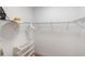 Organized walk-in closet featuring white wire shelving, hat, hanger, and shoe rack for optimal storage at 108 Maraviya Blvd, Nokomis, FL 34275