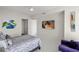 Comfortable bedroom featuring modern accents, closet and an artwork-filled wall for a personalized touch at 1155 N Gulfstream Ave # 708, Sarasota, FL 34236