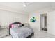 Relaxing bedroom features sleek, modern furnishings, zebra-print bedding, and stylish ceiling fan at 1155 N Gulfstream Ave # 708, Sarasota, FL 34236