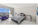 Contemporary bedroom with marina views, featuring modern furniture and stylish zebra-print bedding accents at 1155 N Gulfstream Ave # 708, Sarasota, FL 34236